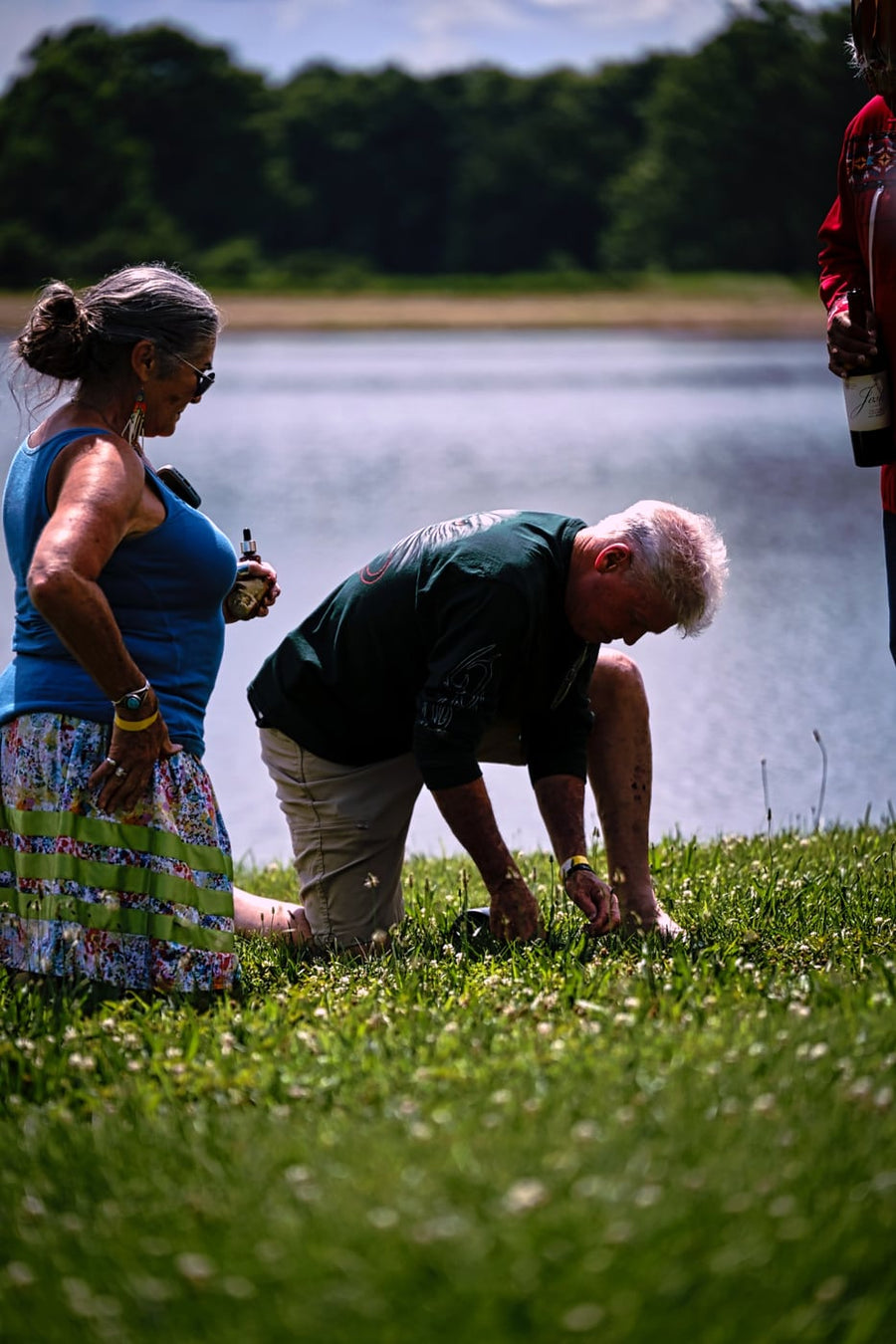 Kneeling at the bank