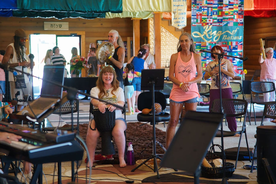 The band and the room under the King of Nations banner