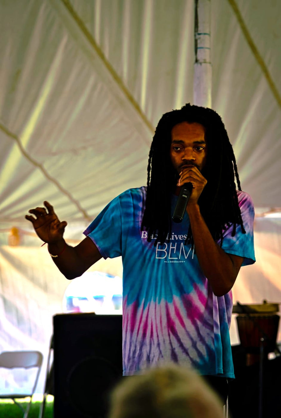 On the mic under the tent
