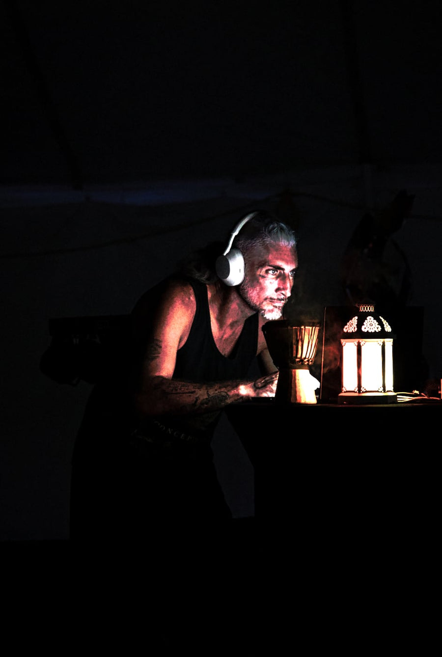 The DJ set by lantern light