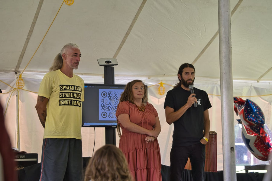 Standing together on the stage as a testimony is given